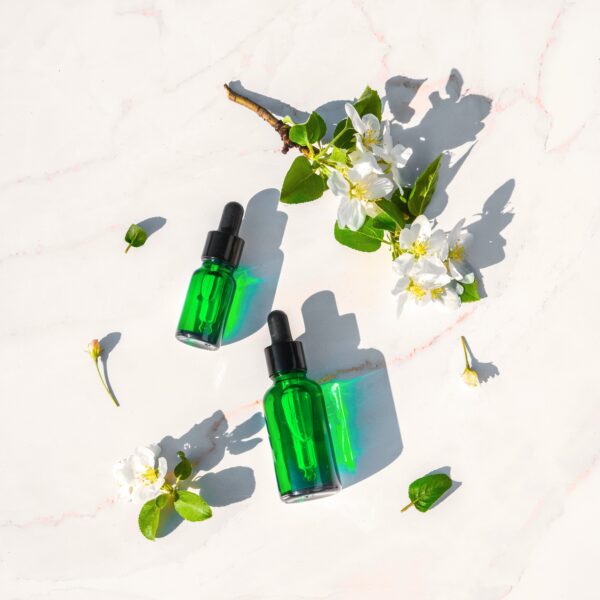 Serum with herbal extracts for skincare. Flat Lay minimalism